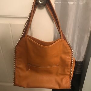 Big Buddha Gold studded handbag